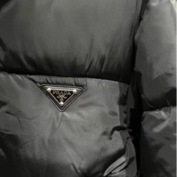 PD22ss giacca a vento con collo alto e logo a triangolo autunno/inverno, giubbotto imbottito in cotone caldo alla moda da donna