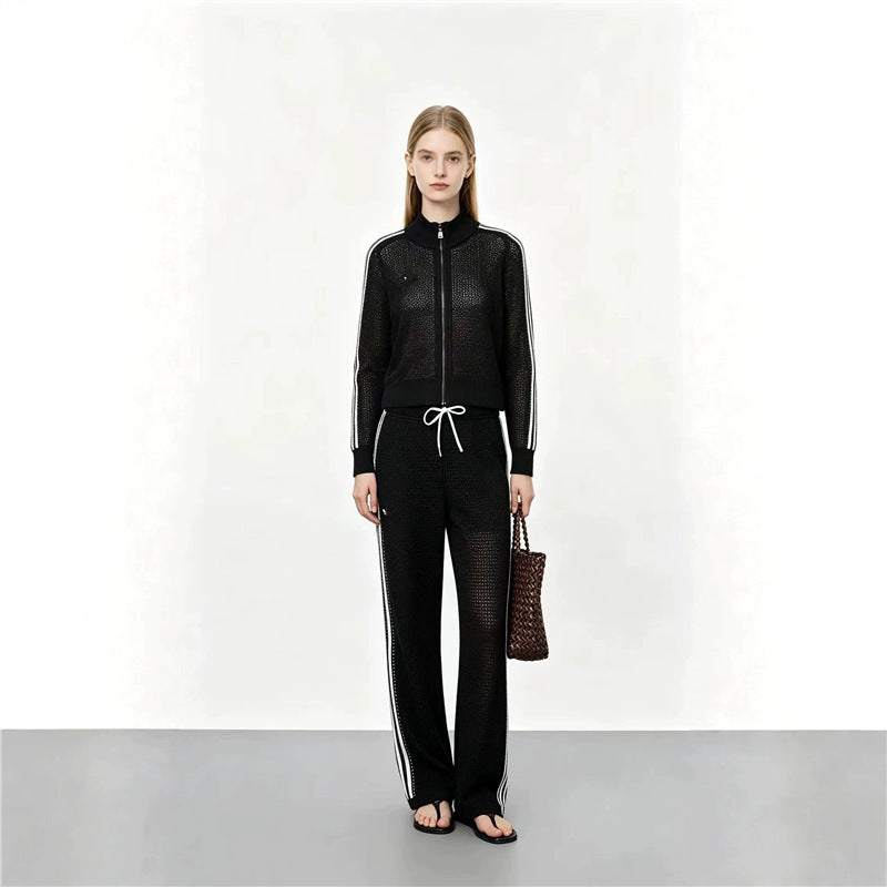 Completo donna in maglia traforata, maglietta a maniche lunghe e pantaloni, due pezzi