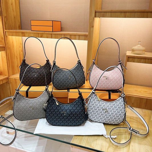 Bolsa de axilas para mujer 2025, nueva y de moda francesa de nicho de alta gama, bolso cruzado de un hombro y media luna