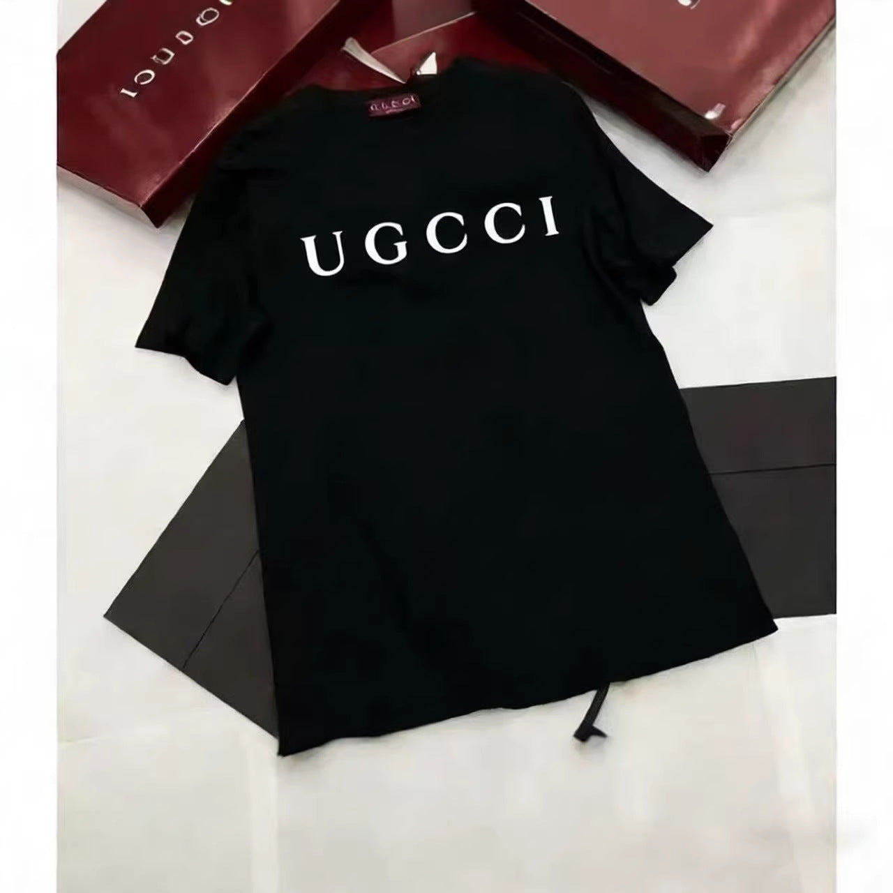 Nueva pareja Gu con cuello redondo de manga corta con cuello redondo con estampado de letras Gu, parejas unisex de moda, versátiles, holgadas y casuales