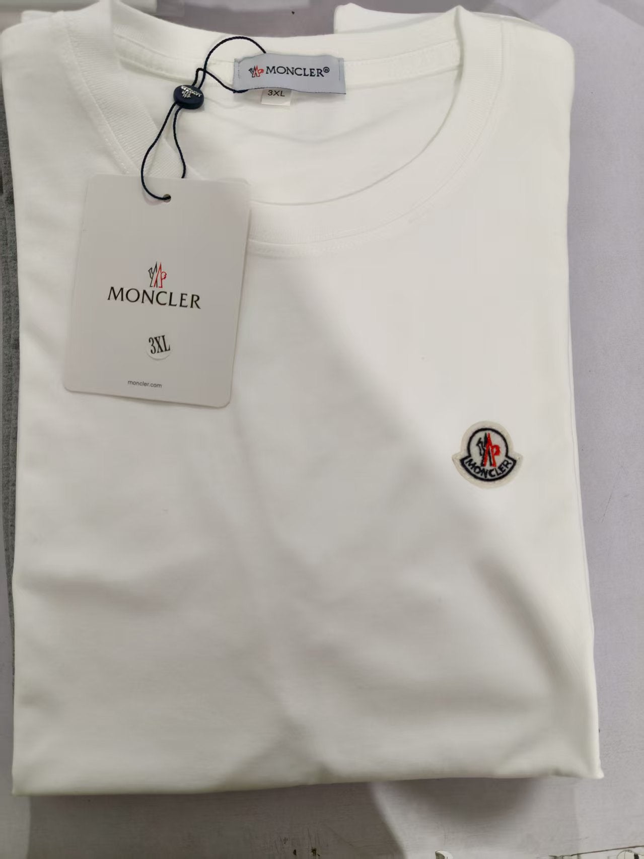 Camiseta Unisex Logo Pegatina Cuello Redondo Manga Corta
