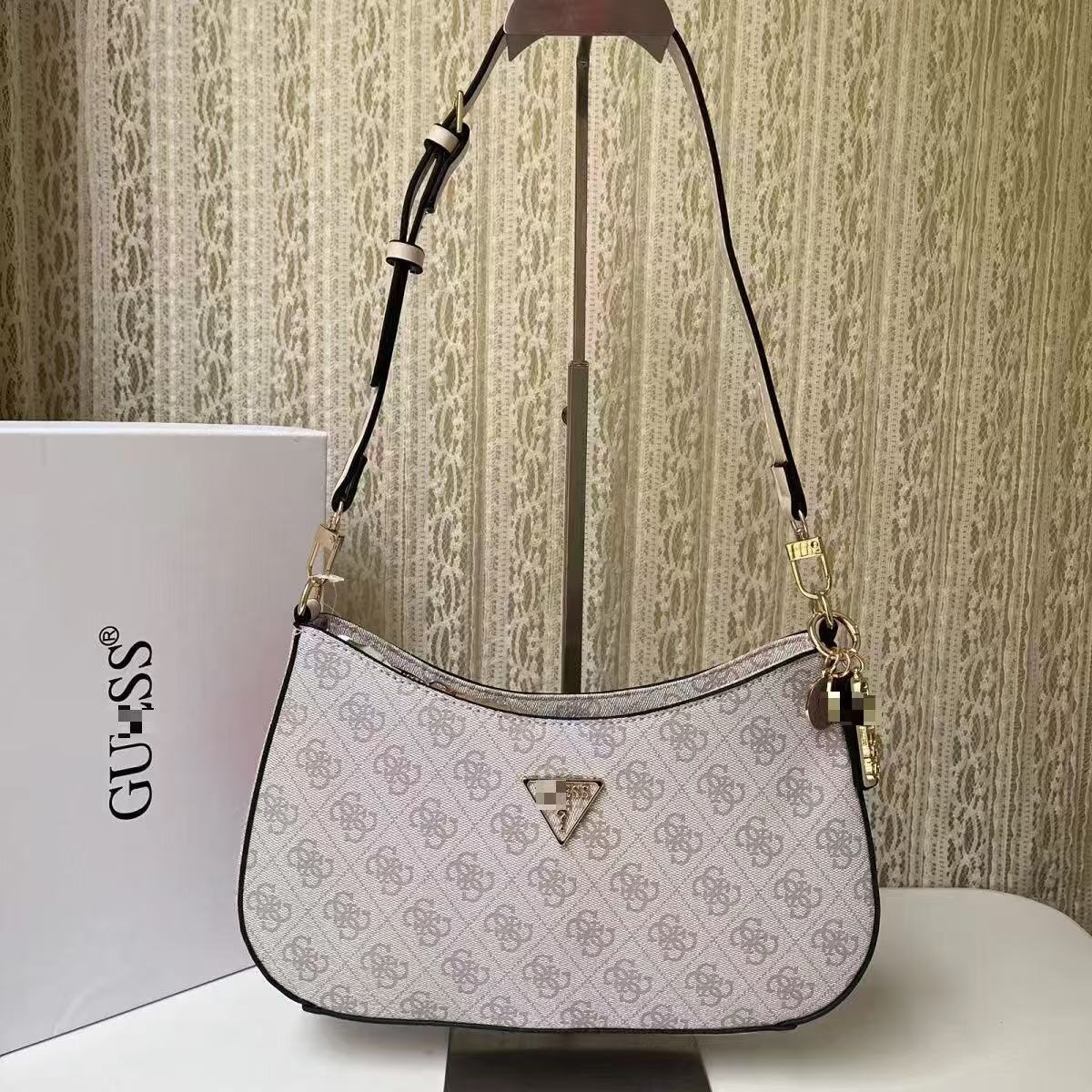 GS Adivina el nuevo bolso europeo y americano sencillo de un solo hombro con viento cruzado y de forma de brazo cruzado, bolso de bolita de color sólido bolso de luna creciente