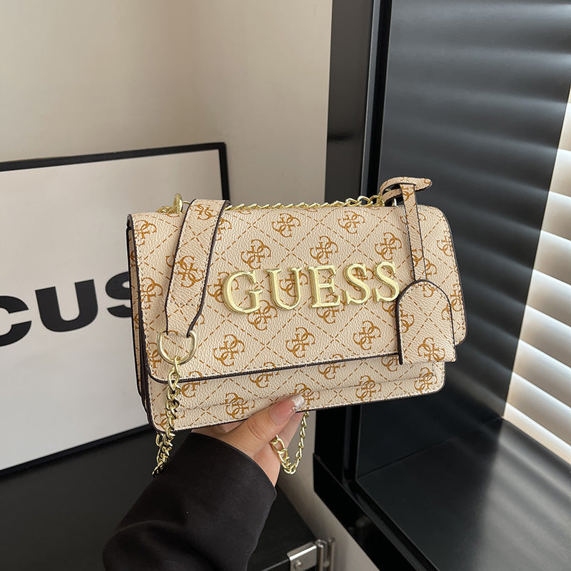 Bolso de mujer vendido de alta calidad Ligero de lujo versátil Bolso de hombro de diseño nicho Bolso de brazo con estampado de letras Bolso de hombro de moda