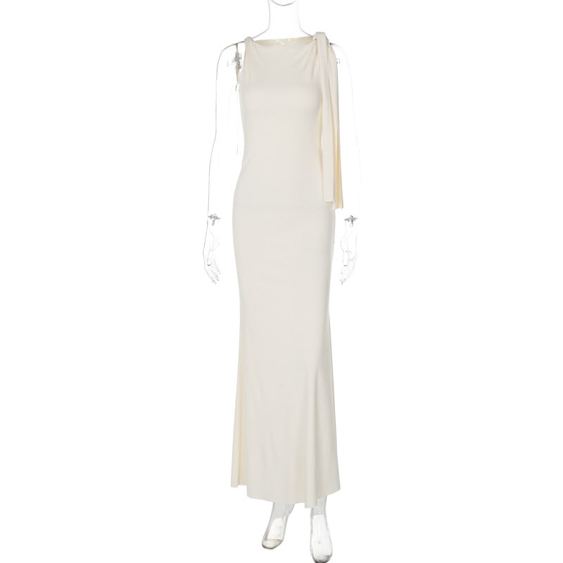 Amazon ropa femenina de venta caliente 2026 verano novedades moda temperamento serpentin de un solo hombro vestido de color sólido para comercio exterior al por mayor