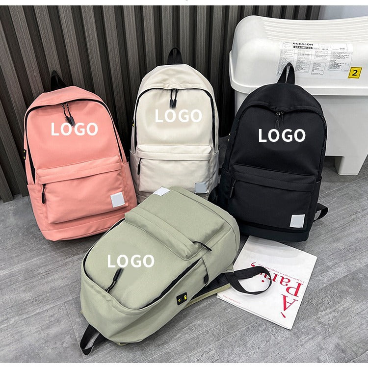 Una mochila de nylon moderna de dropshipping, mochila estampada de gran capacidad y con estampado elegante, mochila de estudiante universitario con alfabeto para la vuelta al cole