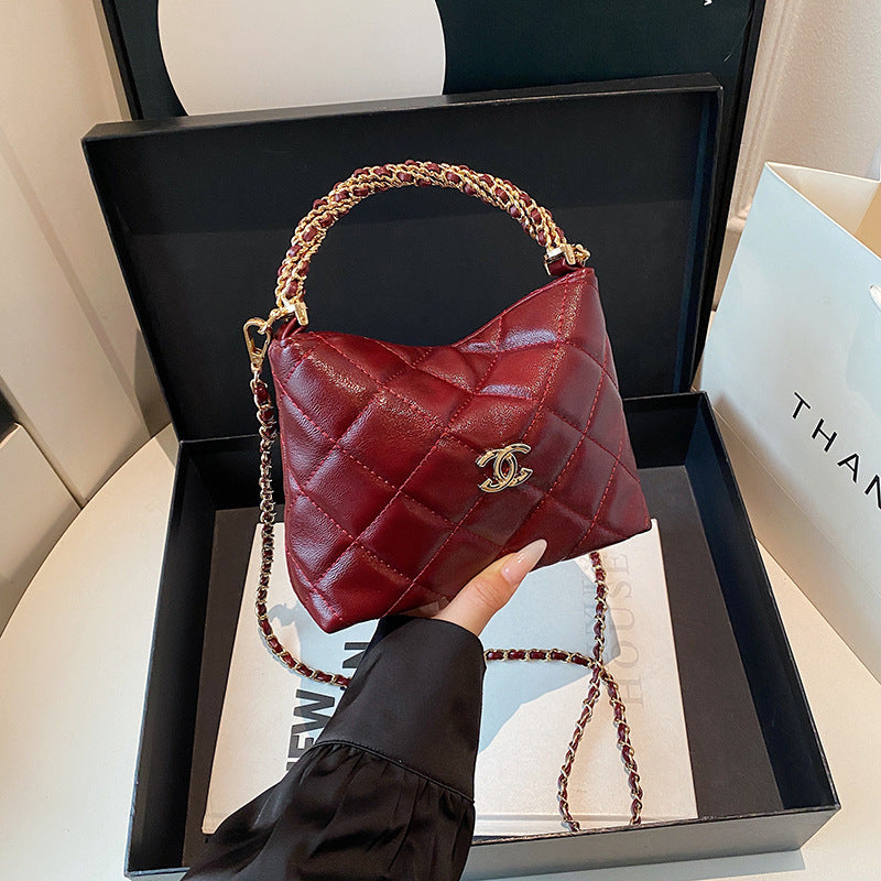 Nuevo bolso de cadena de diamante, bolso de asa torcida Xiangjia, bolso de mujer moderno, bandolera de un solo hombro, bolso de cubo vintage de cuero encerado