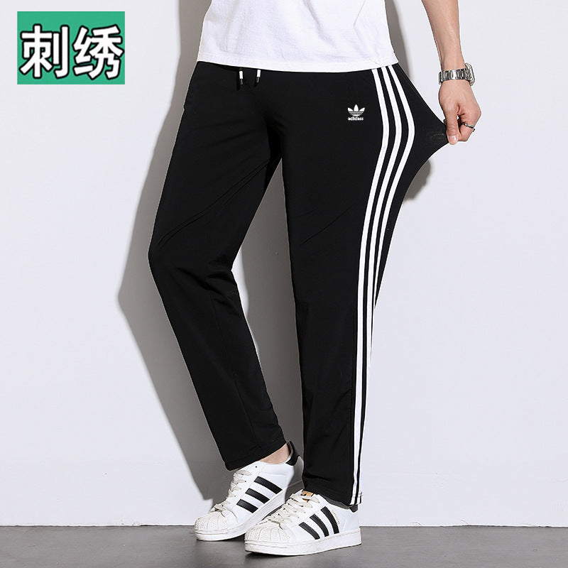 Pantalones deportivos de seda hielo de tres rayas para hombres y mujeres, pantalones finos casuales de verano, pantalones transpirables de alta elasticidad y secado rápido para hombres