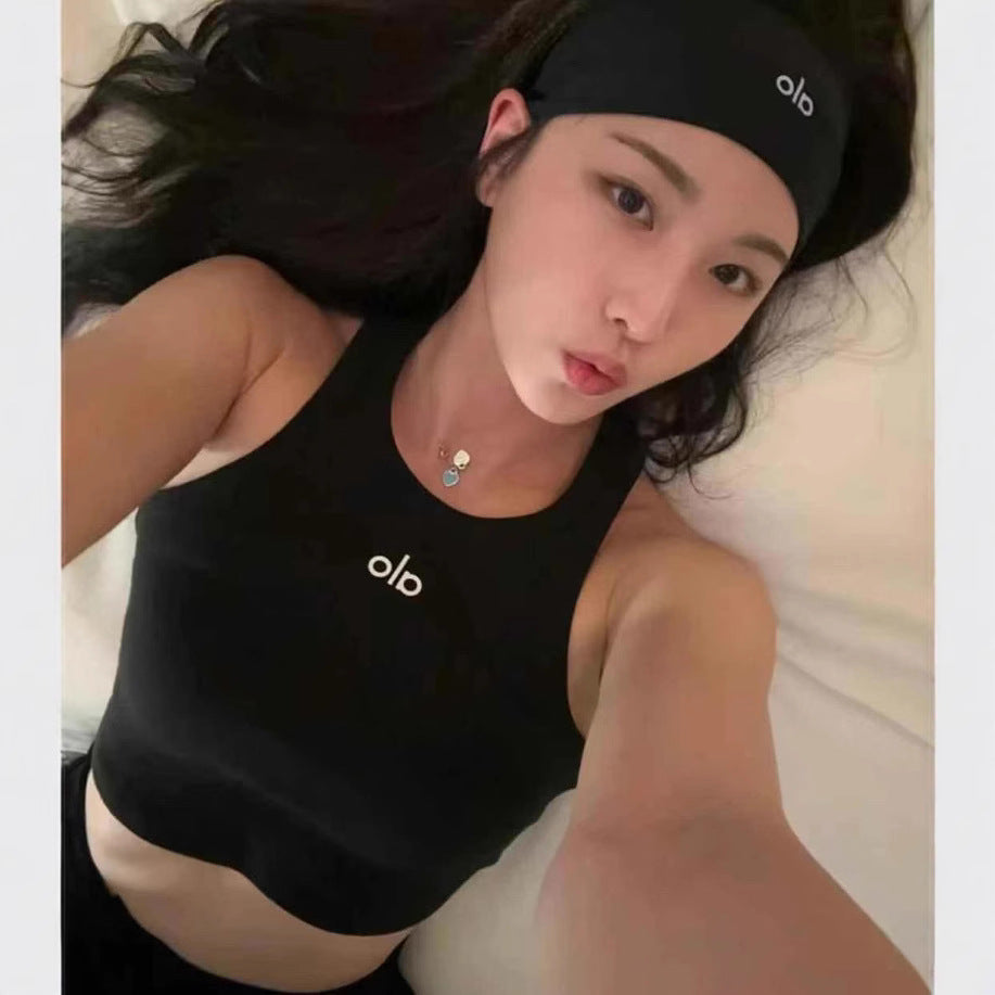 Alo versátil camiseta deportiva deportiva europea y estadounidense de yoga, dopamina deportiva fitness sujetador camisola de punto expuesta para mujer