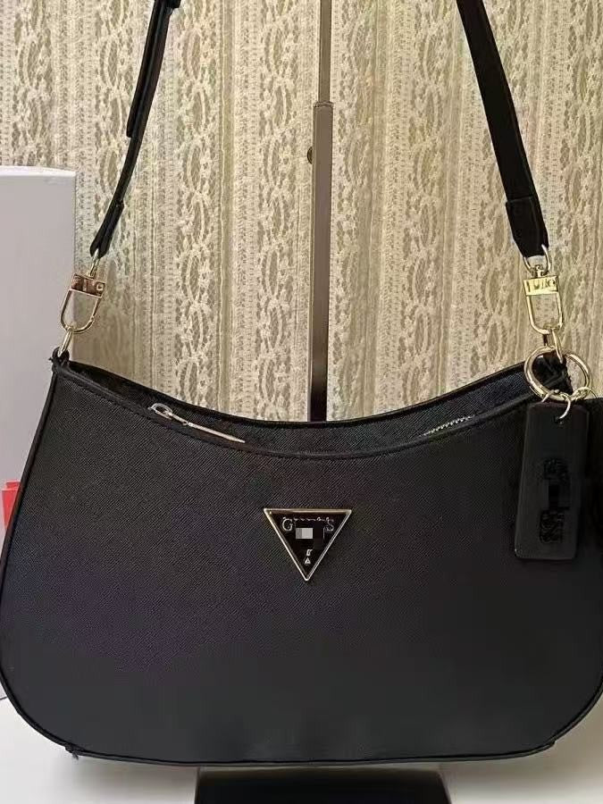 GS Adivina el nuevo bolso europeo y americano sencillo de un solo hombro con viento cruzado y de forma de brazo cruzado, bolso de bolita de color sólido bolso de luna creciente