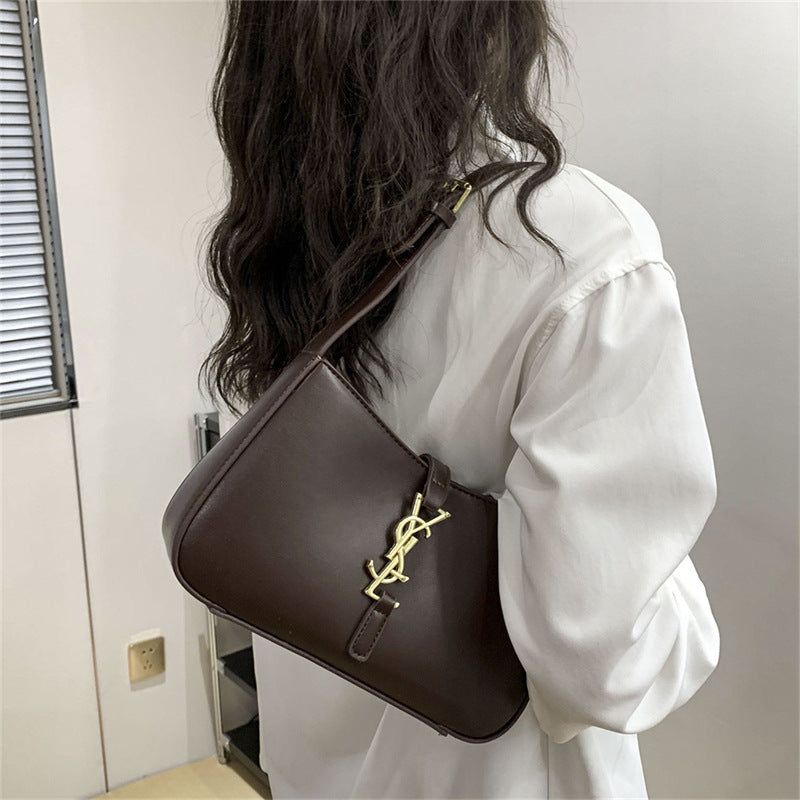 Bolso pequeño de alta gama para mujer, nuevo bolso de cuero suave y moderno en las axilas 2025, bolso baguette elegante para mujer, bolso de un solo hombro
