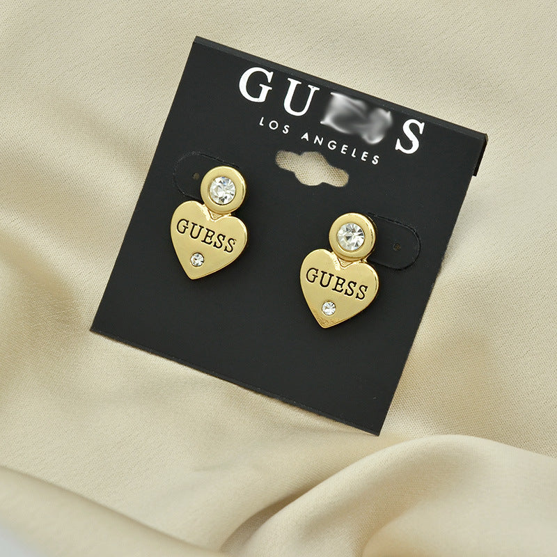 Letras incrustadas de corazón melocotón europeas y estadounidenses exportan, pendientes sencillos de pendientes para mujer, elegancia de nicho
