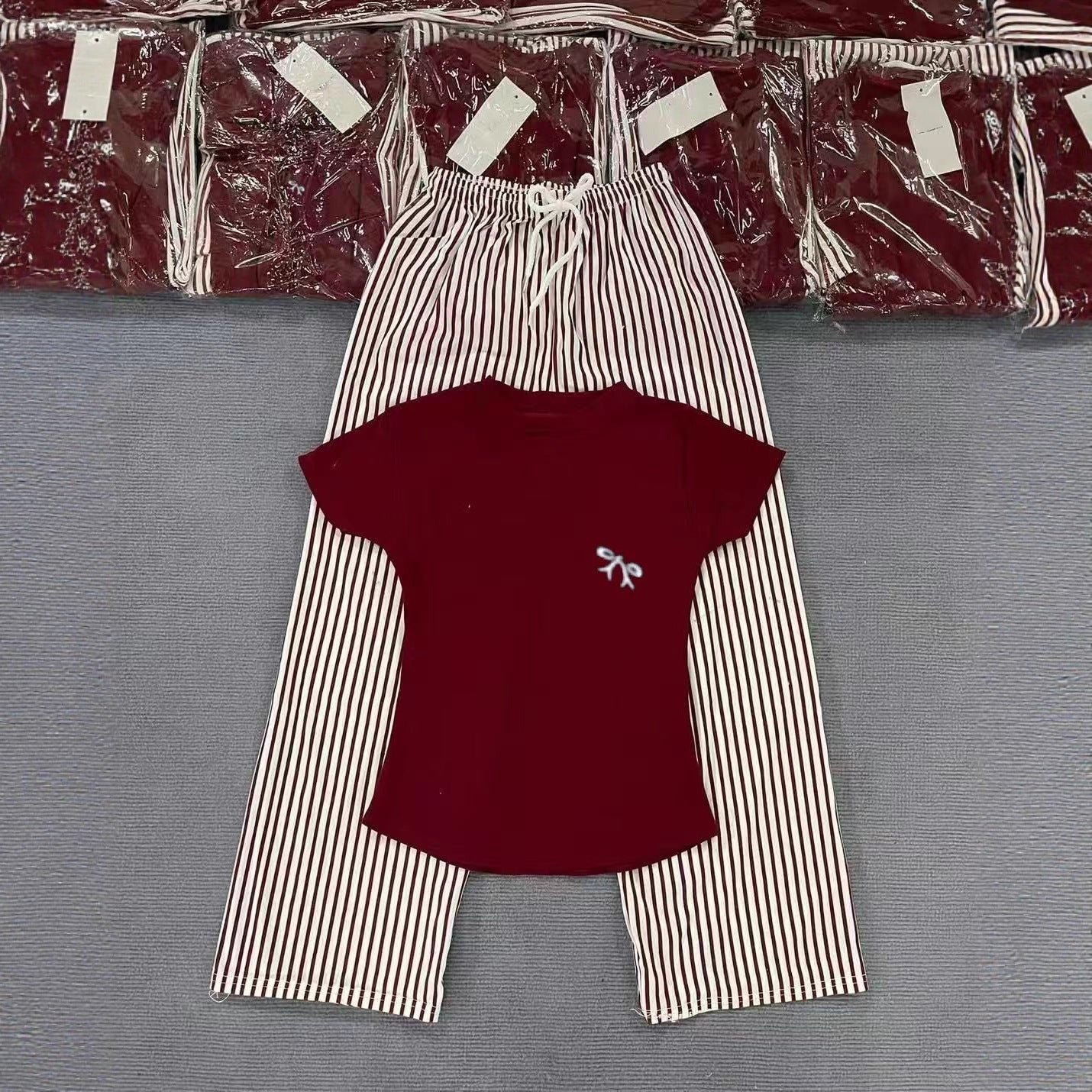 Conjunto de moda de comercio exterior, camiseta nueva de verano para mujer de manga corta bordada y suelta, pantalones anchos de rayas, conjunto informal de dos piezas, ins.