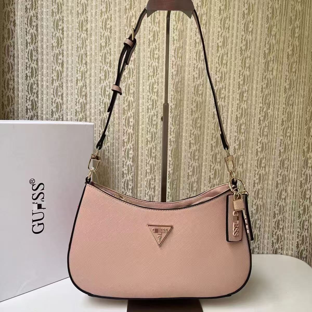 GS Adivina el nuevo bolso europeo y americano sencillo de un solo hombro con viento cruzado y de forma de brazo cruzado, bolso de bolita de color sólido bolso de luna creciente