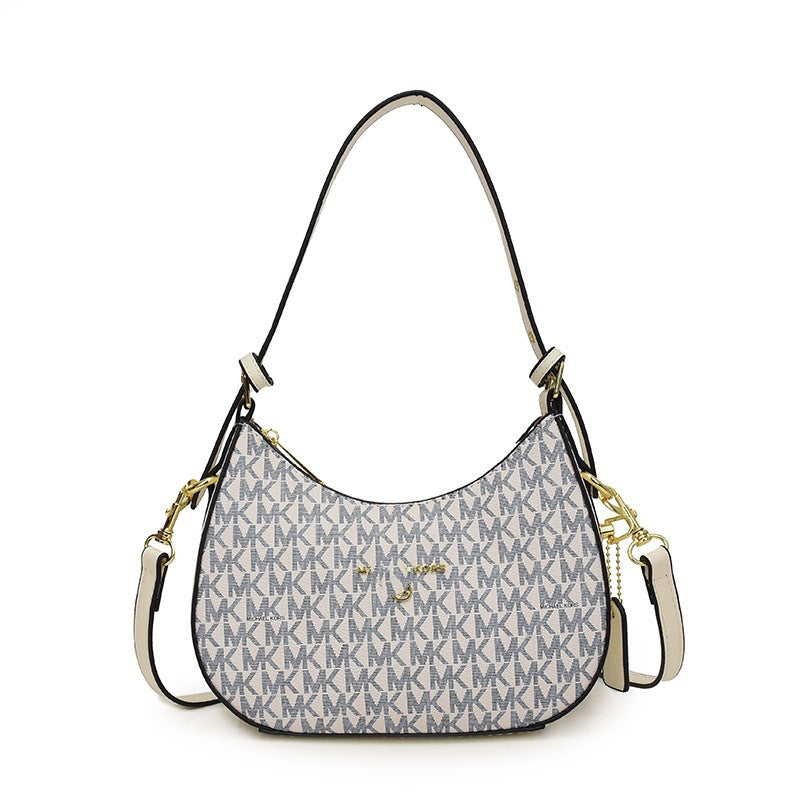 Bolsa de axilas para mujer 2025, nueva y de moda francesa de nicho de alta gama, bolso cruzado de un hombro y media luna