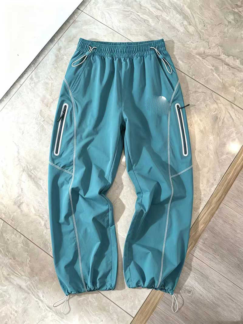 Nouvelle tendance urbaine décontractée 2026 : Pantalons longs taille mi-haute polyvalents et superposés, style unisexe à rayures, couleur unie, respirants, légers et aérés