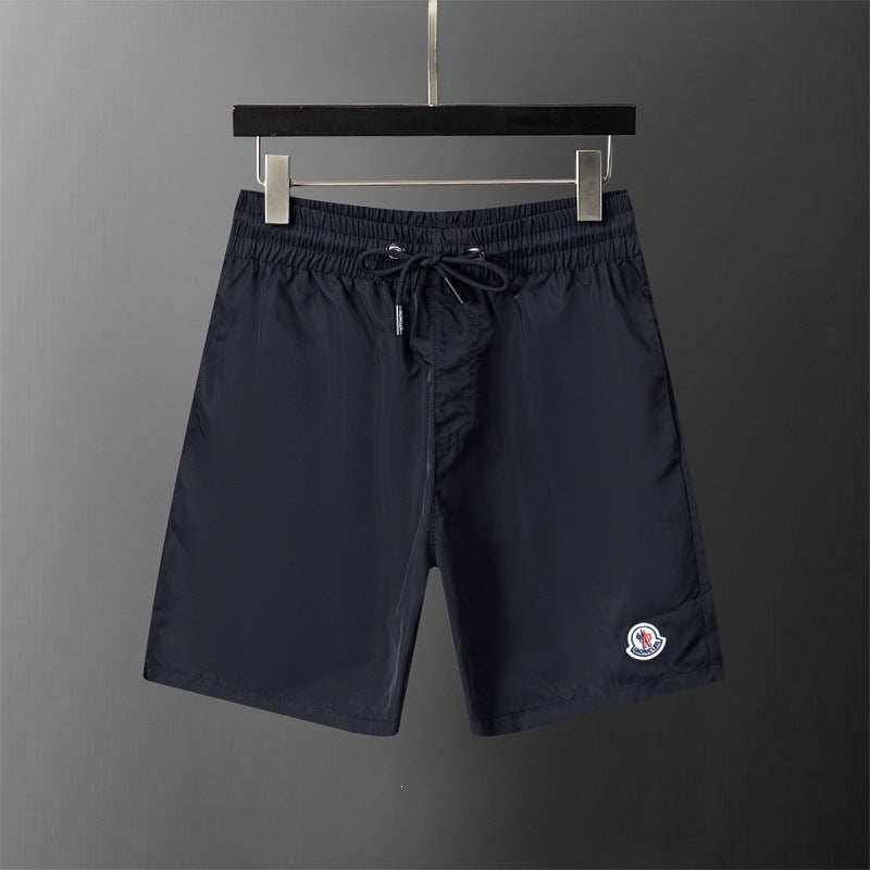 Pantalón deportivo deportivo de cinco puntos transpirable y transpirable de alta calidad y venta transfronteriza de verano de alta calidad y venta caliente