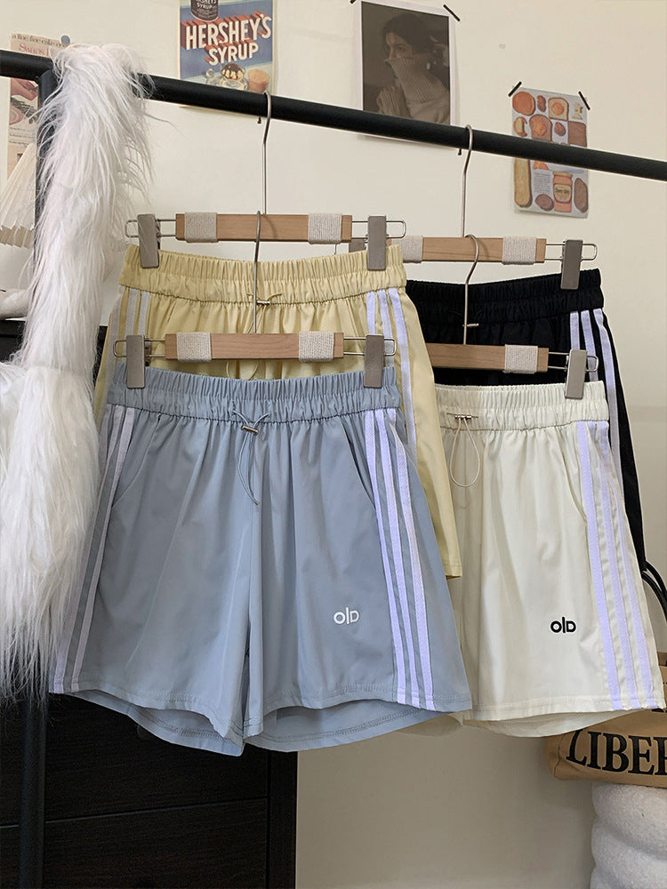 Pantalones cortos casuales para mujer, verano 2026, nuevos pantalones de talla alta de talla alta, ajustados, versátiles de talla grande y de pierna ancha de tres rayas