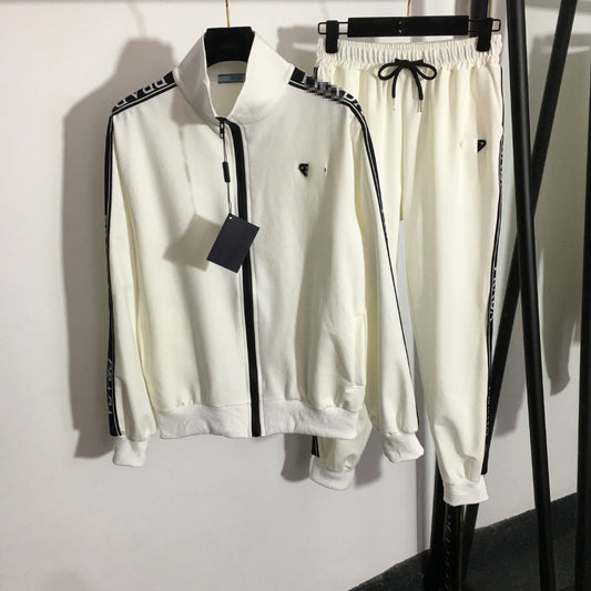 Chaqueta de camiseta de manga larga con cremallera + borde de cinta con cintura elástica de cintura y pantalones casuales de la Nanyou de alta gama triángulo