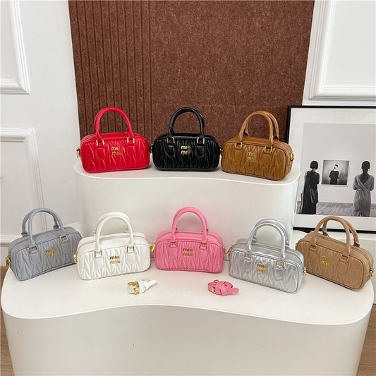 Bolso de bolos de alta gama y de moda cuidadosamente seleccionado, nuevo bolso Boston 2025, bolso cruzado versátil de hombro para mujer