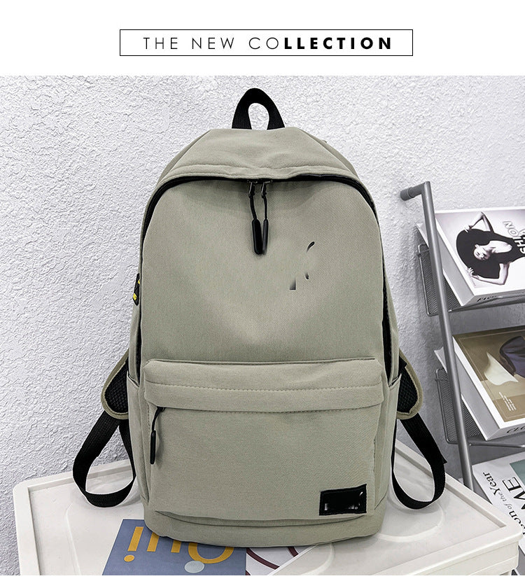 Una mochila de nylon moderna de dropshipping, mochila estampada de gran capacidad y con estampado elegante, mochila de estudiante universitario con alfabeto para la vuelta al cole