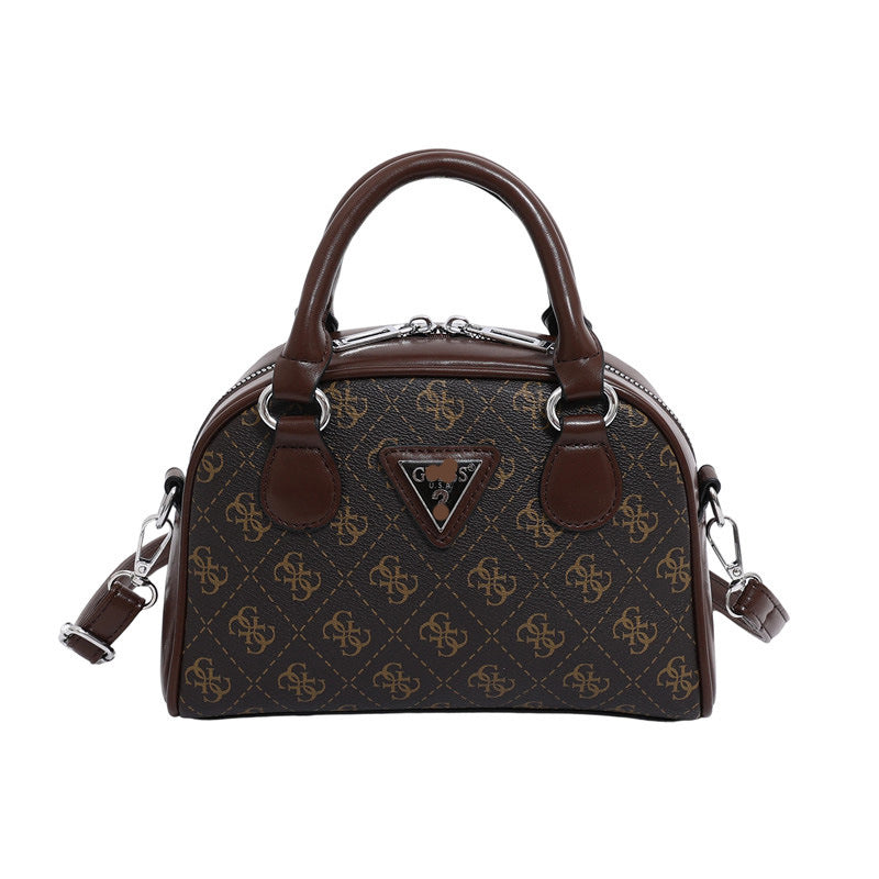 Comercio extranjero bolso de un solo hombro flor antigua para mujer otoño e invierno 2025 bolso de bolos contrastante bolso bandolera de moda y versátil
