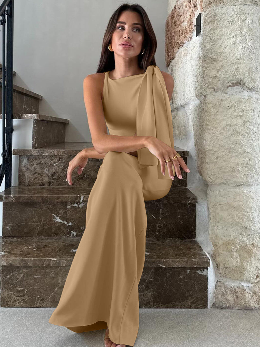 Amazon ropa femenina de venta caliente 2026 verano novedades moda temperamento serpentin de un solo hombro vestido de color sólido para comercio exterior al por mayor