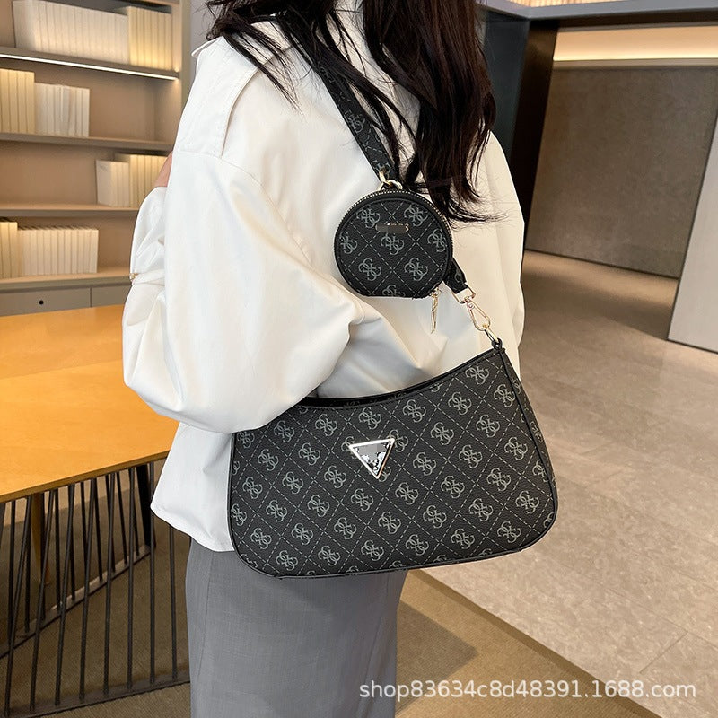Comercio exterior al por mayor, bolso retro GS Guesser europeo y americano, bolso de hombro de moda de suegra con estampado transfronterizo