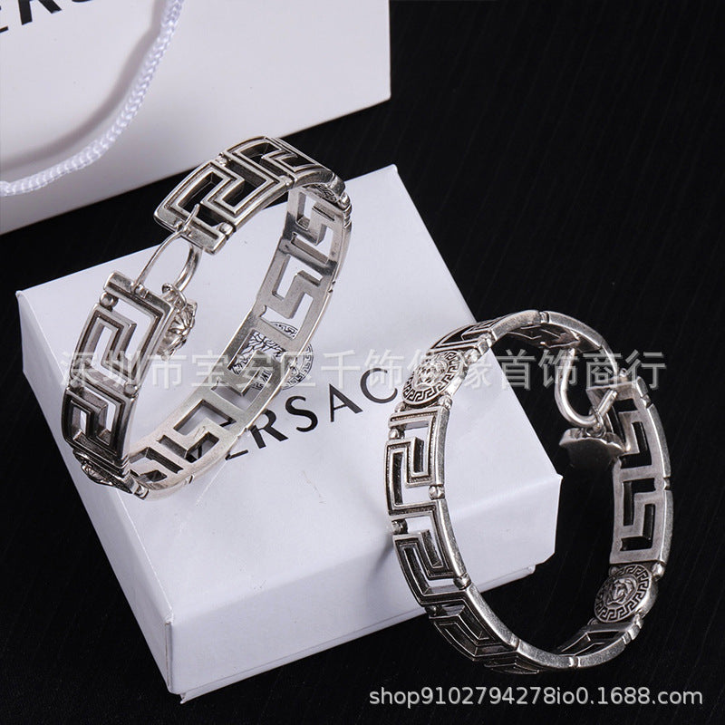 Colección de pendientes Man Family Medusa: pendientes de perla incrustados con diamantes, estilo personalizado extravagante, pendientes ligeros y lujosos