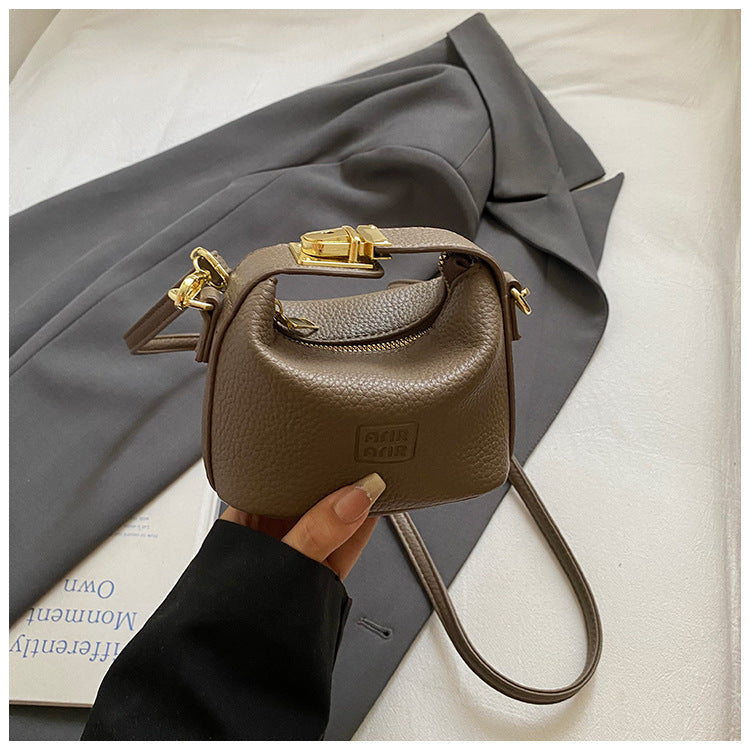 2025 Otoño Nuevo Nicho Bolso de Mano de Color Liso Alta Estética Casual Mono de Cuero Suave de Hombro Bandolera Bolso Pequeño Cuadrado