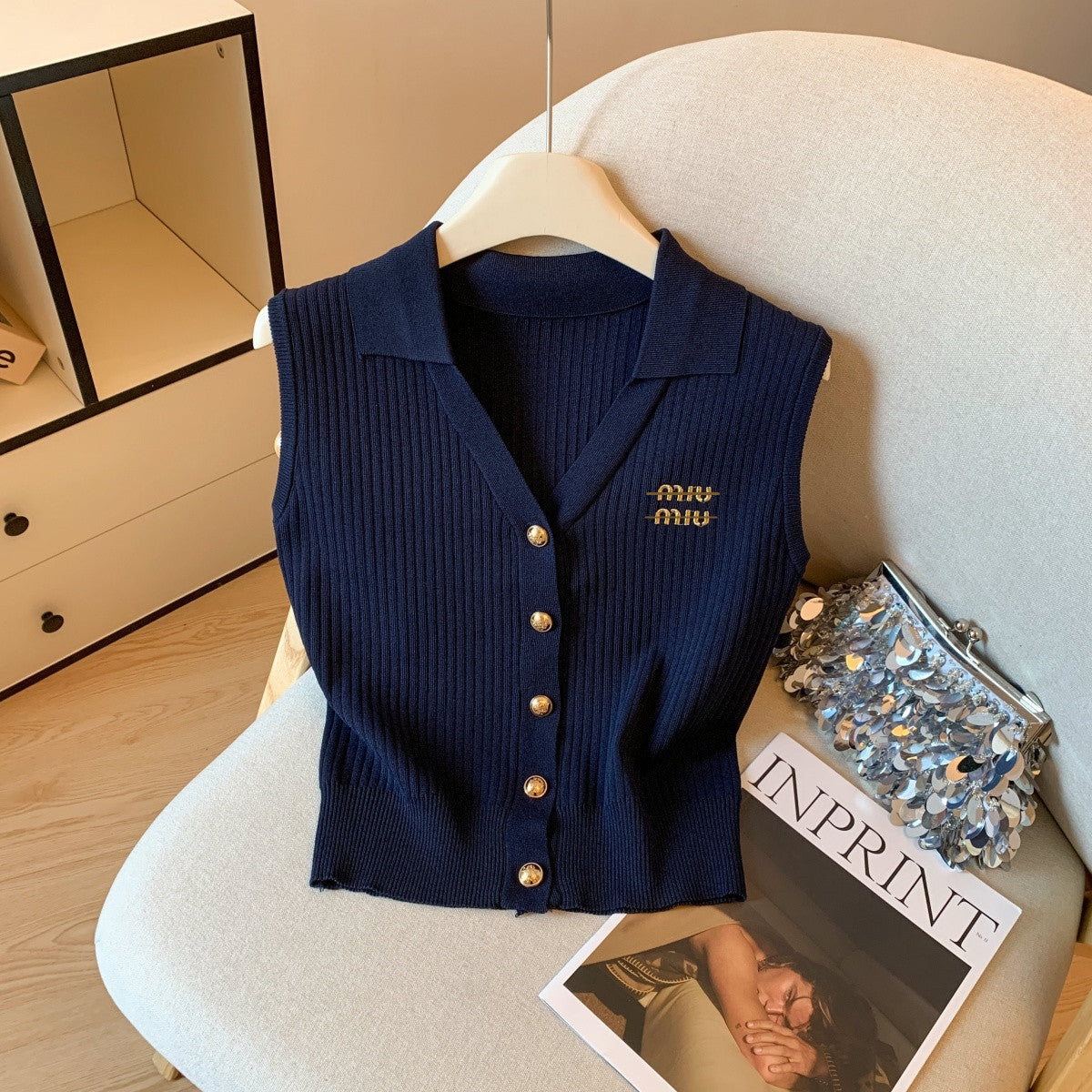 Ligero lujo y chaleco sin mangas estilo Chanel de alta gama, verano 2026 nuevo top de punto bordado versátil bordado