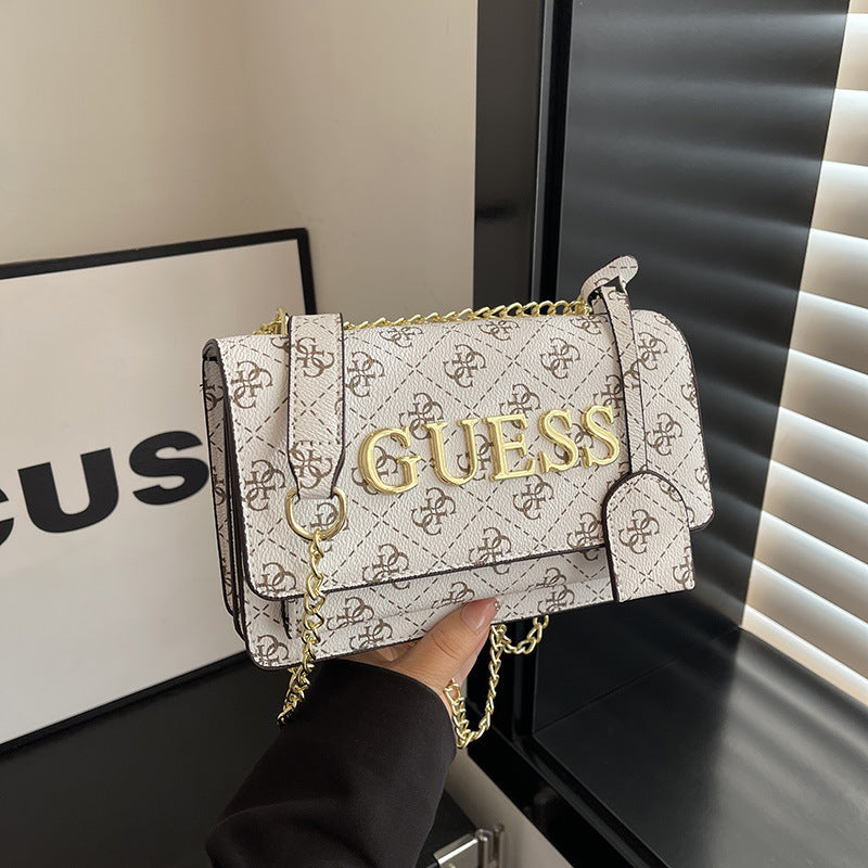 Bolso de mujer vendido de alta calidad Ligero de lujo versátil Bolso de hombro de diseño nicho Bolso de brazo con estampado de letras Bolso de hombro de moda
