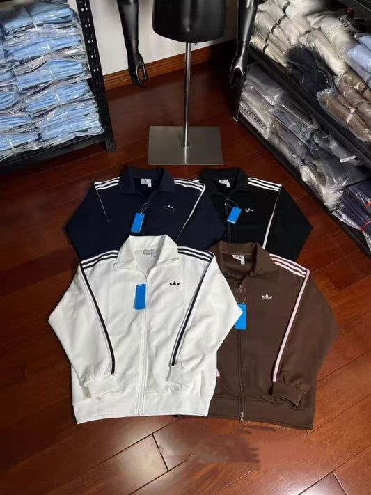 Veste de sport unisexe | Trois bandes et col montant