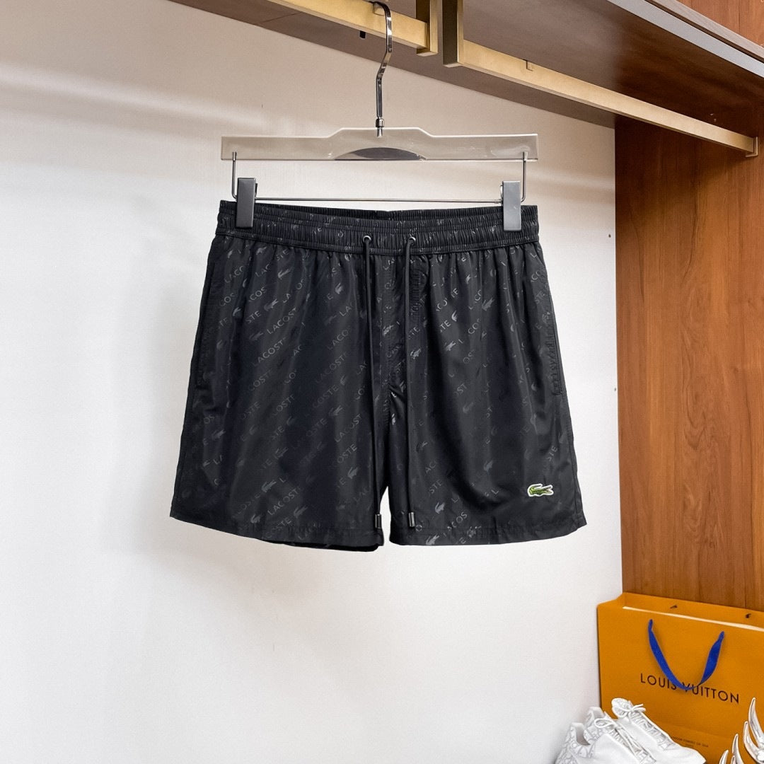 Nuevos pantalones cortos de playa para verano, pantalones deportivos casuales de secado rápido, estilo masculino holgado en stock, otras marcas
