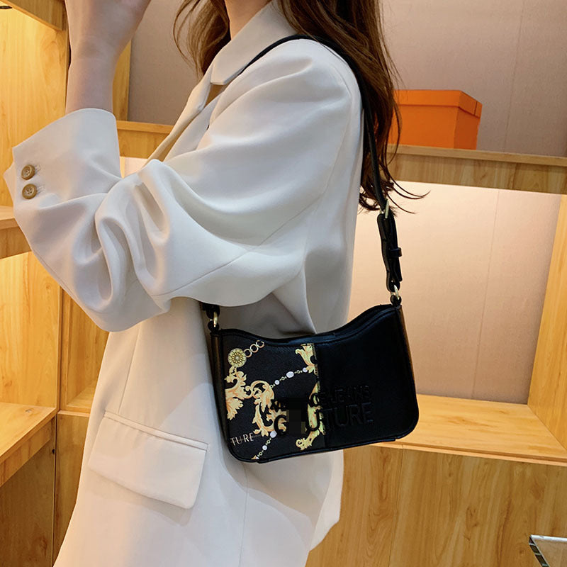 Bolsa de brazo de diseño francés de nicho, nueva moda casual de alta gama, versátil con costura y cadena estampada de alta gama, bolso de hombro