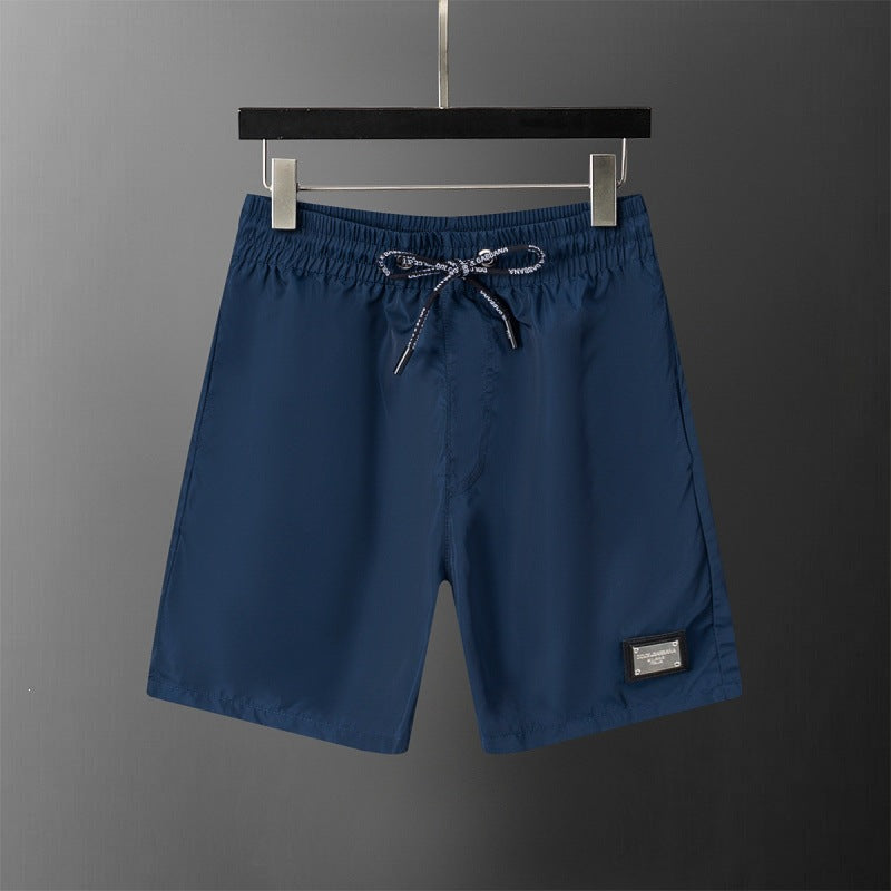 Pantalón deportivo deportivo de cinco puntos transpirable y transpirable de alta calidad y venta transfronteriza de verano de alta calidad y venta caliente