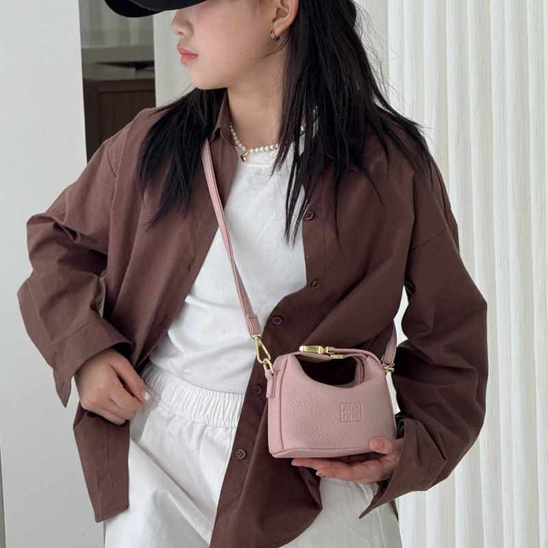 Bolso mini de dumplings de vaquero transfronterizo, bolso ligero de lujo de alta gama, versátil y de moda, bolso de mujer, bolso bandolera infantil de nicho coreano