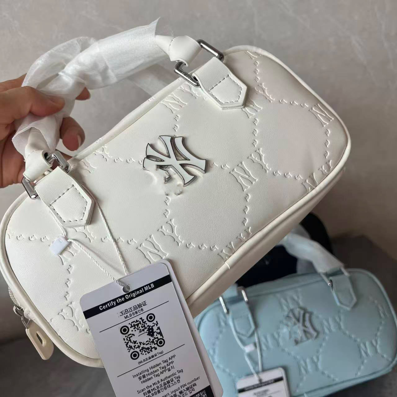 Mini bolso de almohada ML, bolso Boston, monograma con patrón oculto primavera/verano 2025, bolso de un solo hombro, bandolera en la axila, color caramelo