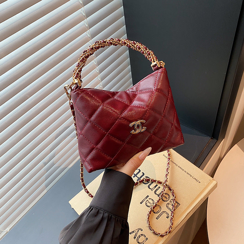 Nuevo bolso de cadena de diamante, bolso de asa torcida Xiangjia, bolso de mujer moderno, bandolera de un solo hombro, bolso de cubo vintage de cuero encerado