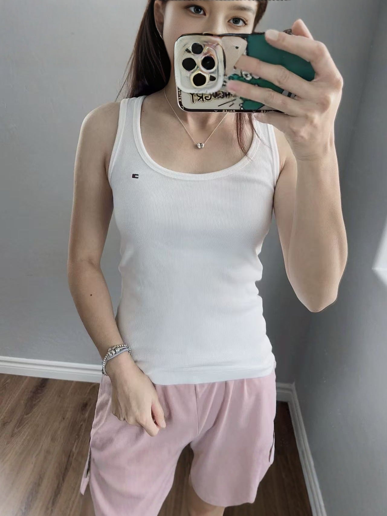 Tom 2025 Verano 2025 Nuevo chaleco acanalado versátil sin mangas de color sólido y camiseta de algodón elástico para mujer