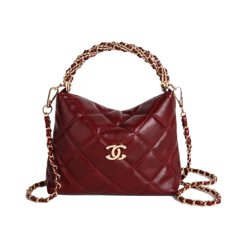 Nuevo bolso de cadena de diamante, bolso de asa torcida Xiangjia, bolso de mujer moderno, bandolera de un solo hombro, bolso de cubo vintage de cuero encerado