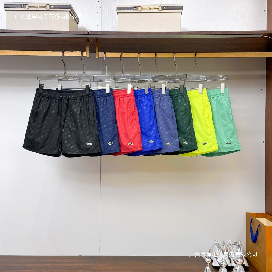 Nuevos pantalones cortos de playa para verano, pantalones deportivos casuales de secado rápido, estilo masculino holgado en stock, otras marcas