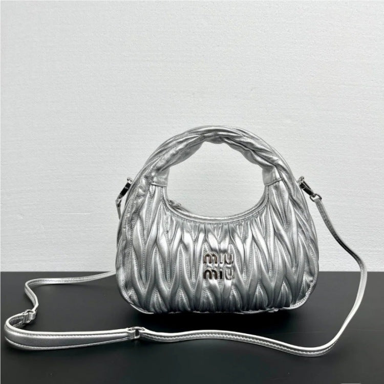 Miu Miu 2026 Nuevo bolso plisado de piel de cordero Mini bolso en forma de media luna en forma de axila Bandolera cruzada de un solo hombro para mujer