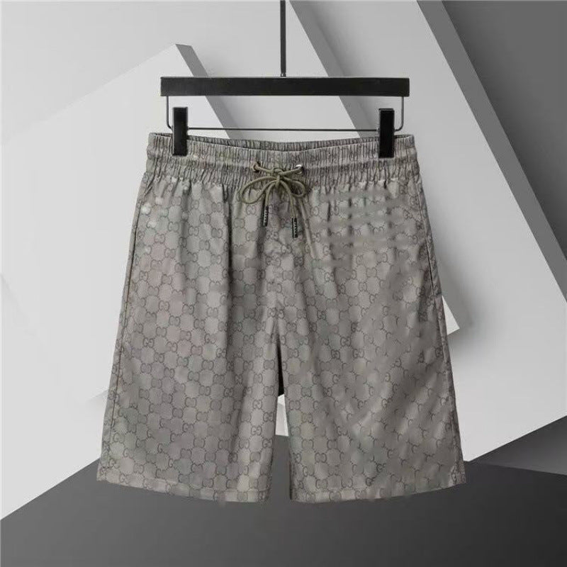 Verano 2026 Nuevos pantalones de playa transfronterizos europeos y americanos de secado rápido, pantalones cortos casuales holgados y de moda al por mayor