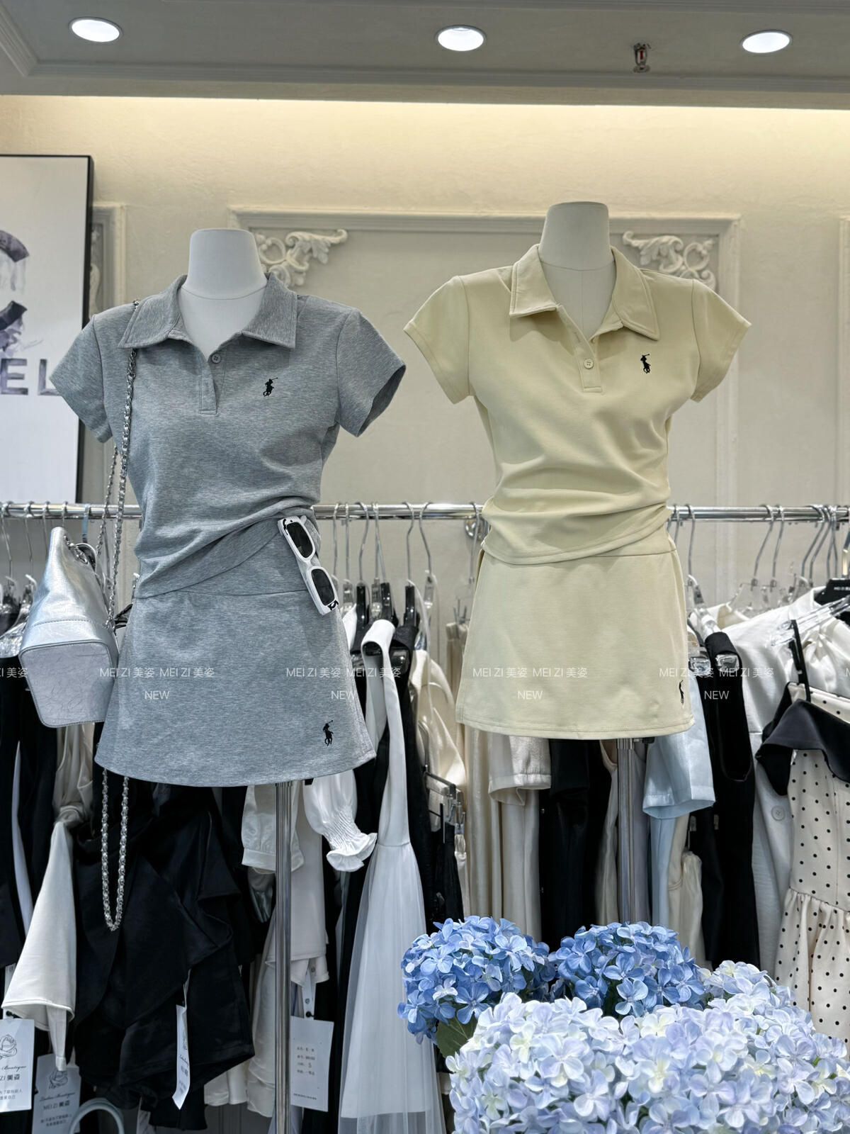 Conjunto deportivo casual para chicas atractivas, camiseta de manga corta de cuello alto para chicas chicas de verano nueva coreana con cuello de poco, conjunto de falda de dos piezas