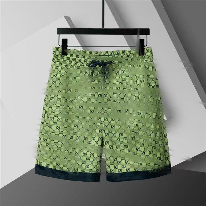Verano 2026 Nuevos pantalones de playa transfronterizos europeos y americanos de secado rápido, pantalones cortos casuales holgados y de moda al por mayor