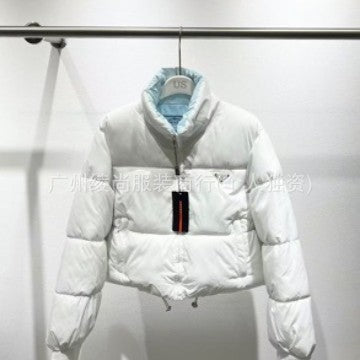 PD22ss giacca a vento con collo alto e logo a triangolo autunno/inverno, giubbotto imbottito in cotone caldo alla moda da donna