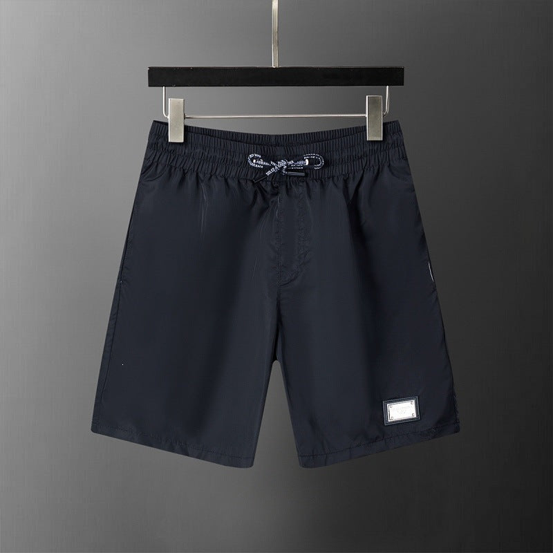 Pantalón deportivo deportivo de cinco puntos transpirable y transpirable de alta calidad y venta transfronteriza de verano de alta calidad y venta caliente