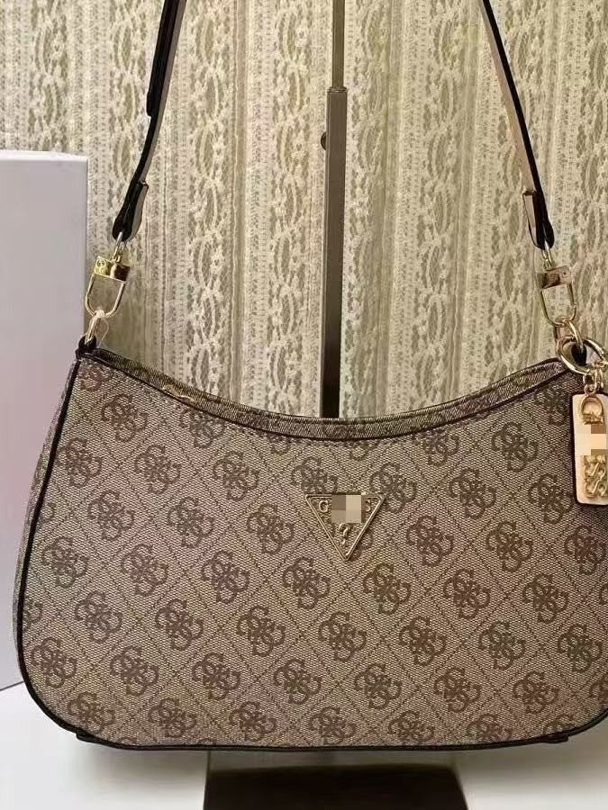 GS Adivina el nuevo bolso europeo y americano sencillo de un solo hombro con viento cruzado y de forma de brazo cruzado, bolso de bolita de color sólido bolso de luna creciente