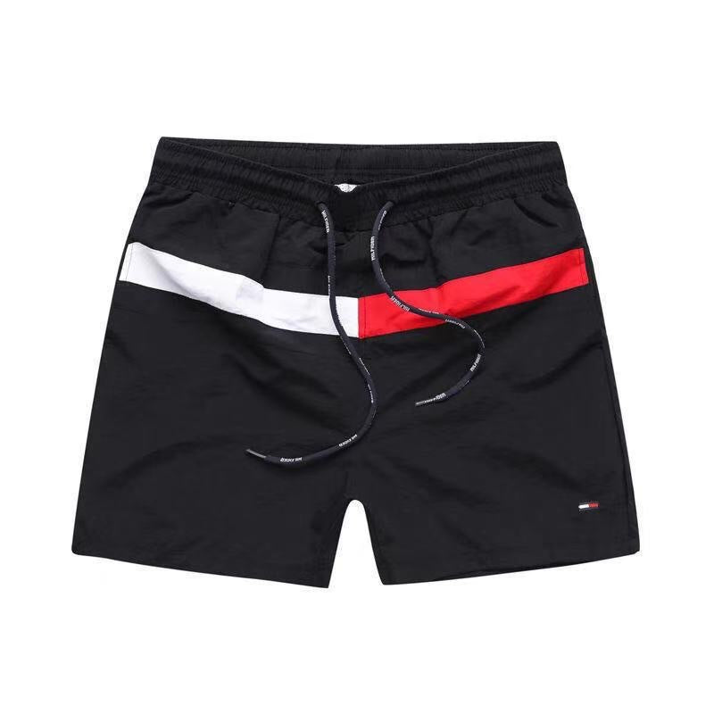 Puesto callejero de fitness para jóvenes de verano transfronterizo, pantalones de tres cuartos de surf en la playa de secado rápido, pantalones cortos deportivos, pantalones cortos de playa europeos y americanos para hombres