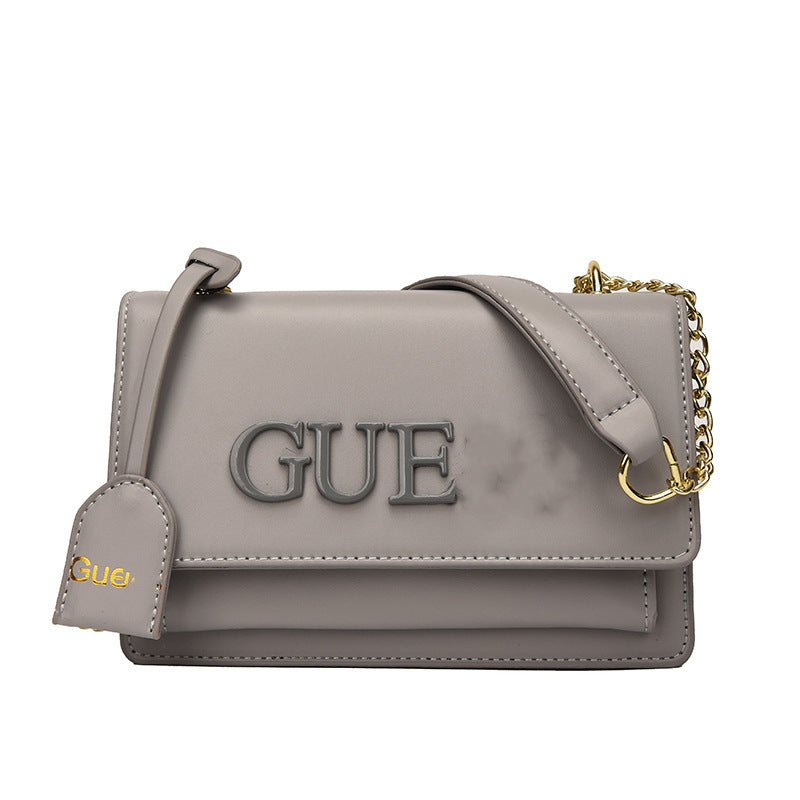 Litera de cadena texturizada de estilo extranjero 2023, solapa de cadena de verano premium, gran capacidad, de gran capacidad, un solo hombro, un solo hombro, un nuevo bolso versátil de moda para mujer